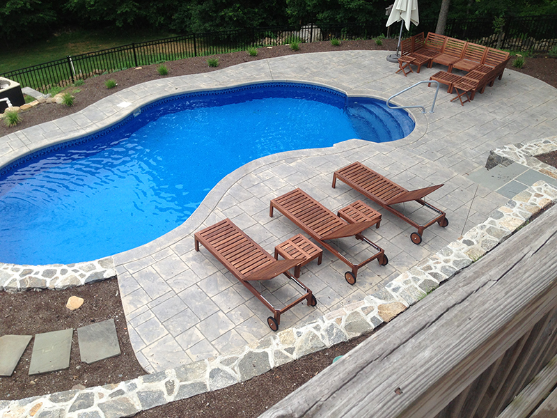 Swimming pool and stamped concrete project example 189